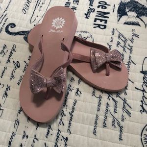 Yellow box pink flip-flops with rhinestone bows